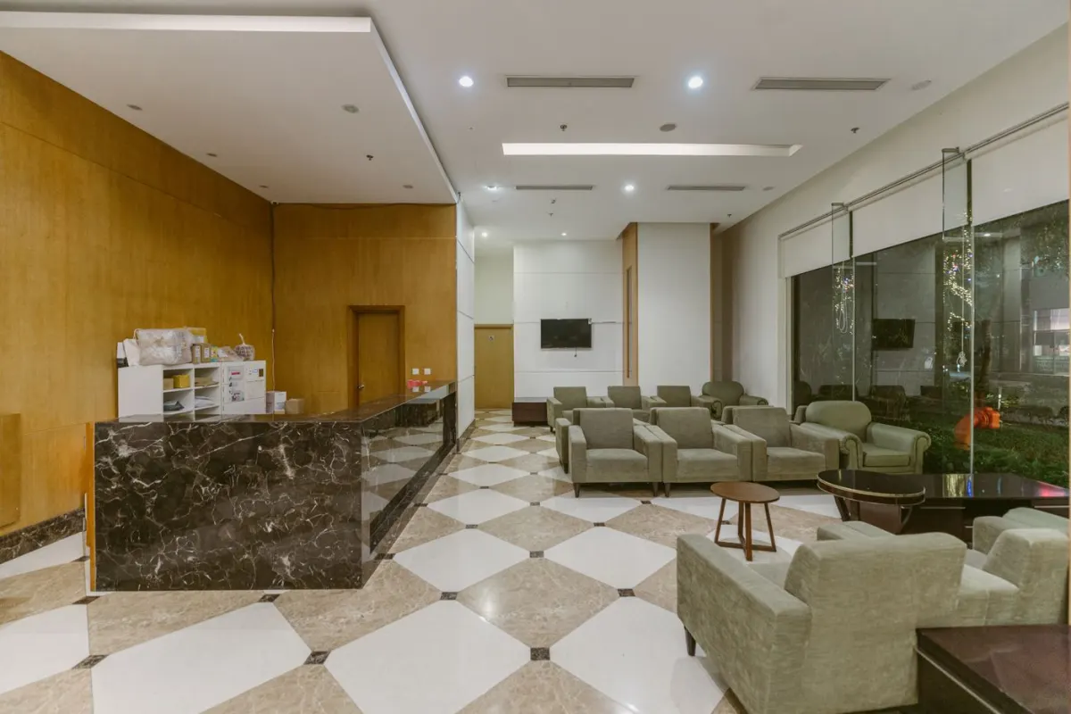 Modern hotel lounge with reception furniture and a spacious seating area