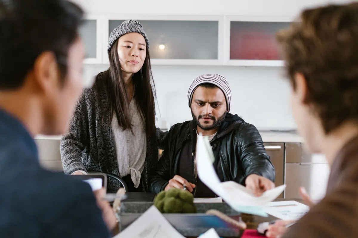 Startup team discussing ideas together in an office